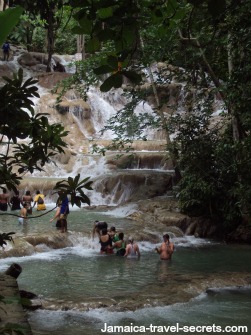 Visitors climbing Dunn's River Falls