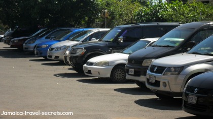A rental car parked beside a Jamaican road